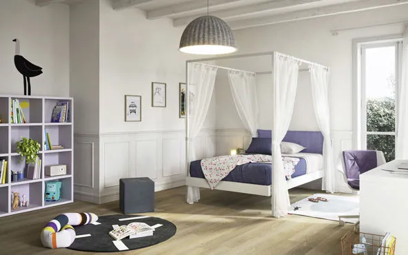 Cameretta moderna con letto a soppalco con piccola libreria "aperta" e scrivania.